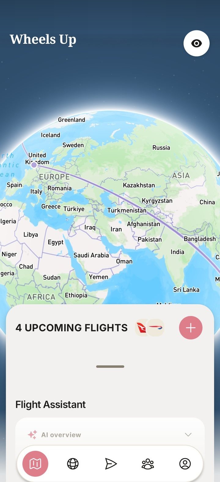 Wheels Up showing a 3D globe with a flight route from Singapore to London and on to New York
